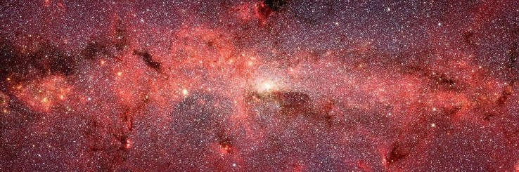 A galactic cloud pulses with star-forming energy.